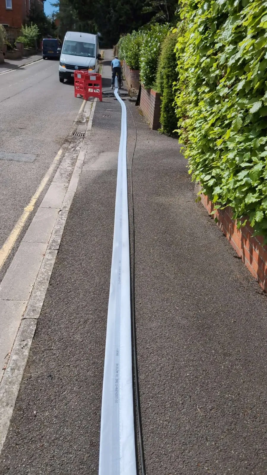 A street with a white line on the side of it.