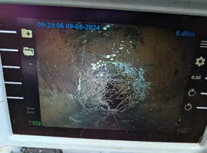 A screen with a cracked glass on it.