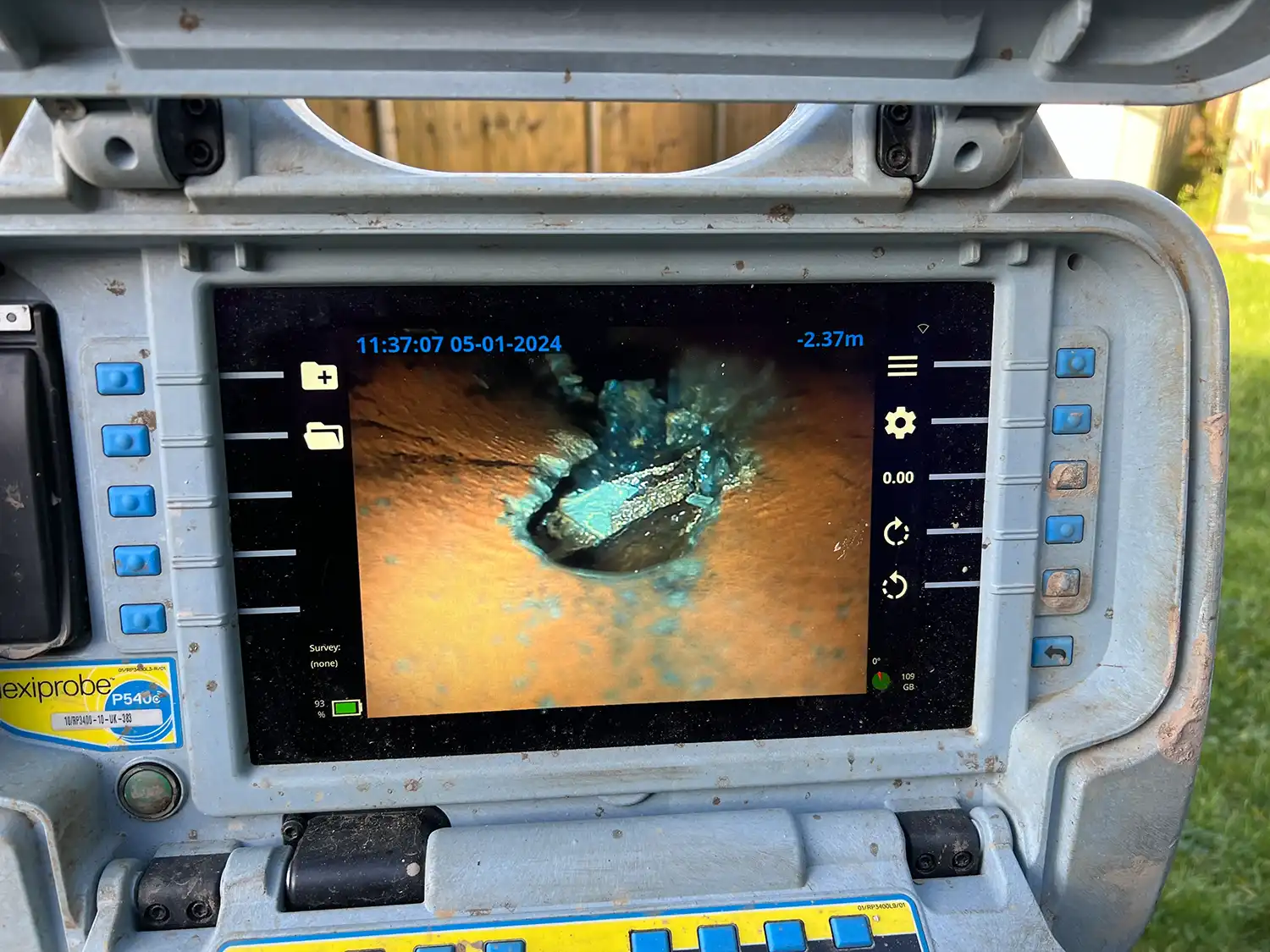 a small camera mounted to the back of a vehicle